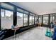 Bright sunroom with multiple windows allowing natural light and views at 3122 37Th S Ln # C, St Petersburg, FL 33711