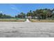 A tennis court is available, surrounded by trees, with a gazebo nearby for enjoying the community at 3122 37Th S Ln # C, St Petersburg, FL 33711