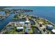 Breathtaking aerial view of the waterfront property, canals and intercoastal waterways at 3174 Sanibel Dr, Hernando Beach, FL 34607