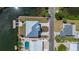 Birds eye view of the house's layout, yard, waterfront access, pool, and neighborhood location at 3174 Sanibel Dr, Hernando Beach, FL 34607