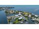 Breathtaking aerial view of waterfront property with easy boating access and stunning bay views at 3174 Sanibel Dr, Hernando Beach, FL 34607
