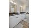 Well-appointed bathroom with double vanity, modern lighting and spacious layout at 3174 Sanibel Dr, Hernando Beach, FL 34607
