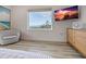 Light-filled bedroom with peaceful water view and a modern dresser at 3174 Sanibel Dr, Hernando Beach, FL 34607