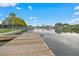 Private dock offers deep water access, ideal for boating and enjoying picturesque waterfront lifestyle at 3174 Sanibel Dr, Hernando Beach, FL 34607