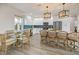 Bright kitchen featuring white cabinetry, stainless steel appliances, and a large island at 3174 Sanibel Dr, Hernando Beach, FL 34607