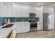 Bright, modern kitchen with stainless appliances and quartz countertops at 3174 Sanibel Dr, Hernando Beach, FL 34607