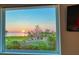 Wonderful view of waterfront home with sunset from the bedroom window at 3174 Sanibel Dr, Hernando Beach, FL 34607
