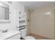 Cozy bathroom with shower, toilet, sink, mirror, and cabinet for storage at 3455 Countryside Blvd # 31, Clearwater, FL 33761