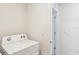 Laundry area with a white dryer at 36557 Night Strawberry Ct, Dade City, FL 33525