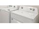 Laundry room showcasing a washer and dryer at 36557 Night Strawberry Ct, Dade City, FL 33525