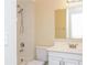 Bathroom featuring a shower-tub combo, neutral walls, and a vanity at 3719 Greenford St, Valrico, FL 33596