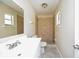 Bathroom featuring tiled shower, neutral walls, and a vanity with storage at 3719 Greenford St, Valrico, FL 33596