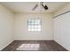 Bedroom featuring neutral walls, carpet, closet, and natural light from the window at 3719 Greenford St, Valrico, FL 33596