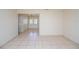 Spacious living room with tile flooring, bright walls, and natural light at 3719 Greenford St, Valrico, FL 33596