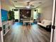 This spacious office features modern accents, luxury vinyl plank floors and natural light at 4407 Scarlet Loop, Wesley Chapel, FL 33544