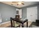 Neutral office with a desk, chair, and large closet space at 4407 Scarlet Loop, Wesley Chapel, FL 33544