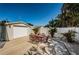 Backyard patio with an outdoor dining set and an exterior view of the detached garage at 451 27Th N Ave, St Petersburg, FL 33704