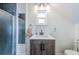 Modern bathroom with a glass-enclosed shower, vanity, and sink at 451 27Th N Ave, St Petersburg, FL 33704