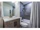 Bathroom featuring a vanity with a modern faucet, toilet, and shower at 451 27Th N Ave, St Petersburg, FL 33704