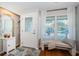 Bright entryway with a decorative front door, window seat, and ample natural light at 451 27Th N Ave, St Petersburg, FL 33704