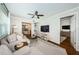 Open living space with comfortable seating, connecting to the kitchen and another room at 451 27Th N Ave, St Petersburg, FL 33704