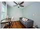Office featuring a desk, couch, window for natural light and hardwood floors at 451 27Th N Ave, St Petersburg, FL 33704