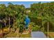 Aerial view of the property with water views at 4519 Swallowtail Dr, New Port Richey, FL 34653