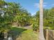 Backyard with a dock and water views at 4519 Swallowtail Dr, New Port Richey, FL 34653