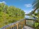 Backyard deck offers serene water views at 4519 Swallowtail Dr, New Port Richey, FL 34653