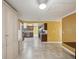 Open floor plan showcases a kitchen with stainless steel appliances and a view into the adjacent living area at 4519 Swallowtail Dr, New Port Richey, FL 34653