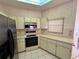 Updated kitchen featuring tile floors and stainless steel appliances at 4593 Goldcoast Ave, Spring Hill, FL 34609