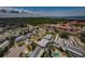 Scenic aerial view showcasing the neighborhood, nearby condos, and serene water views in this beautiful coastal community at 4704 Shale Pl, Tampa, FL 33615