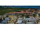 Scenic aerial view showcasing the neighborhood, nearby condos, and serene water views in this beautiful coastal community at 4704 Shale Pl, Tampa, FL 33615