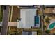 Aerial view of the home with a backyard pool and well-maintained landscaping, creating a private oasis at 4704 Shale Pl, Tampa, FL 33615