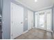 Inviting entryway with tile flooring and a decorative glass front door at 4704 Shale Pl, Tampa, FL 33615