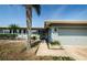 Charming home with a well-maintained front yard, mature landscaping, and a welcoming entrance at 4704 Shale Pl, Tampa, FL 33615