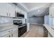 Modern kitchen boasts stainless steel appliances, elegant countertops, and ample cabinet space at 4704 Shale Pl, Tampa, FL 33615