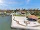 Beautiful aerial view of beach and condo community featuring a pool, beach access, picnic area and water views at 4900 Brittany S Dr # 805, St Petersburg, FL 33715