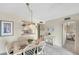 Cozy dining room with a view into the modern kitchen at 4900 Brittany S Dr # 805, St Petersburg, FL 33715
