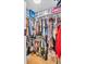Walk-in closet with extensive storage solutions and well-organized clothing racks at 5021 Roanoke Dr, Holiday, FL 34690