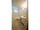 Bathroom features a tub/shower combo with tile surround and neutral vanity at 5122 Dove Dr, New Port Richey, FL 34652