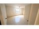 Bright bedroom with tile flooring, a ceiling fan and natural light at 5122 Dove Dr, New Port Richey, FL 34652
