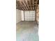 View of the garage and overhead door at 5122 Dove Dr, New Port Richey, FL 34652