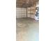 View of the garage and overhead door at 5122 Dove Dr, New Port Richey, FL 34652