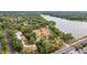 Aerial view of John S Taylor Park with lake, playgrounds, picnic and parking areas at 650 Arbor Ln, Largo, FL 33770
