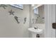 Charming half-bathroom with seahorse decor and a pedestal sink at 650 Arbor Ln, Largo, FL 33770