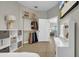 Light bedroom featuring closet organizer and vanity at 650 Arbor Ln, Largo, FL 33770