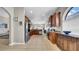 Spacious kitchen boasts stainless steel appliances, granite countertops, and abundant cabinet storage at 650 Arbor Ln, Largo, FL 33770