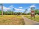 Inviting park shelter with picnic tables on grassy field under a blue sky at 650 Arbor Ln, Largo, FL 33770