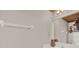 Bathroom features a vanity, towel rack, and mirror with wood trim at 6526 Summer Cove Dr, Riverview, FL 33578